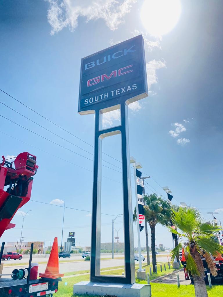 Installed towering signage for South Texas Buick-GMC, showcasing the dealership's brand with impressive prominence.